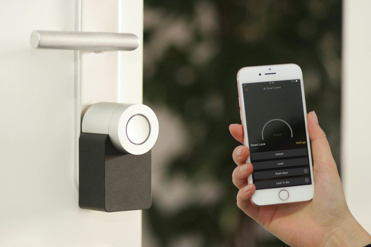 Phone app unlocking a smart lock at the door