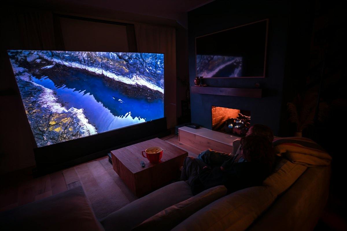 Big projection screen in a dark living room