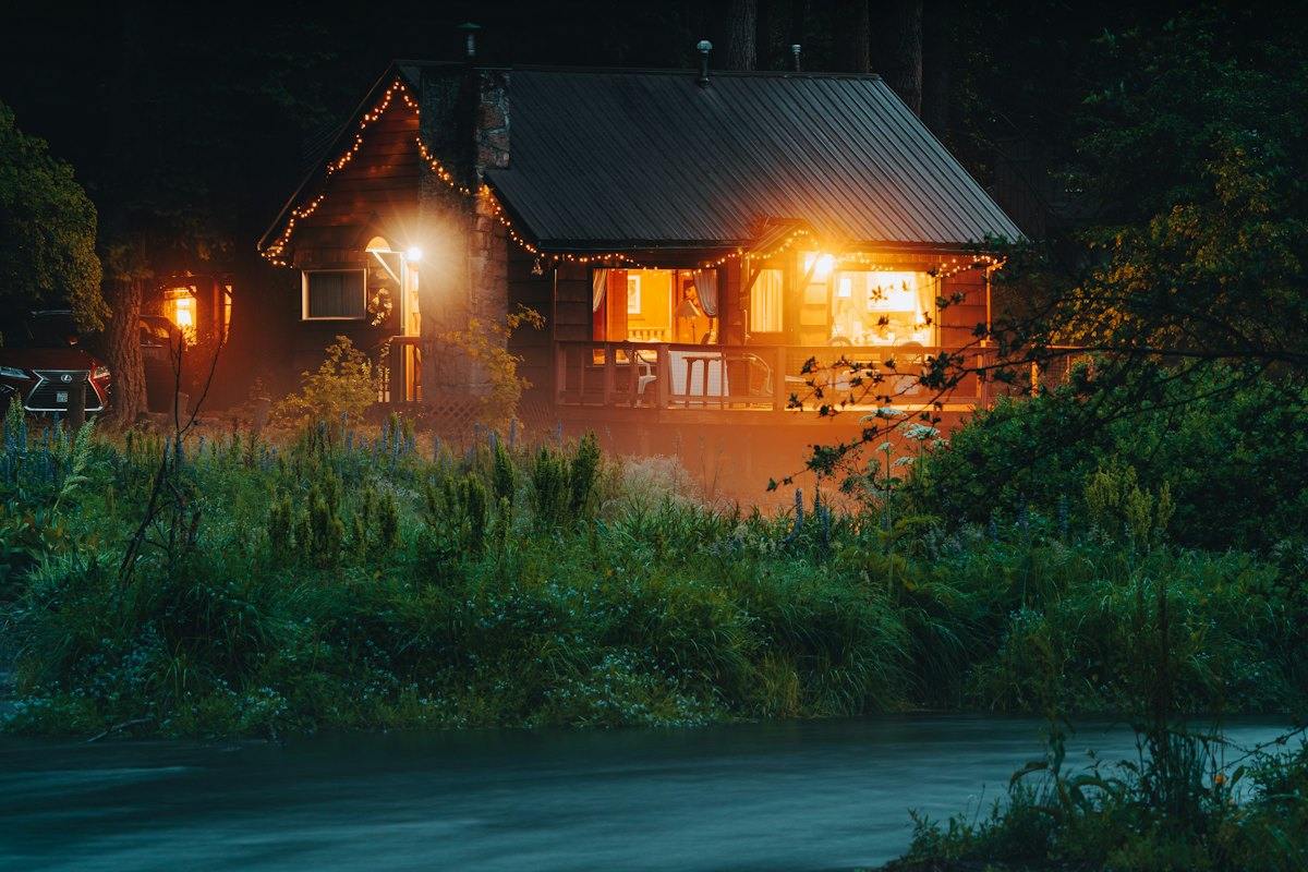 House and yard lit at night