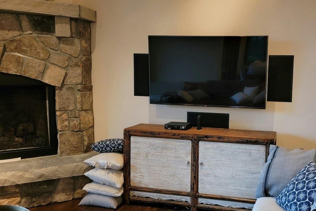 Living room with TV and wall speakers