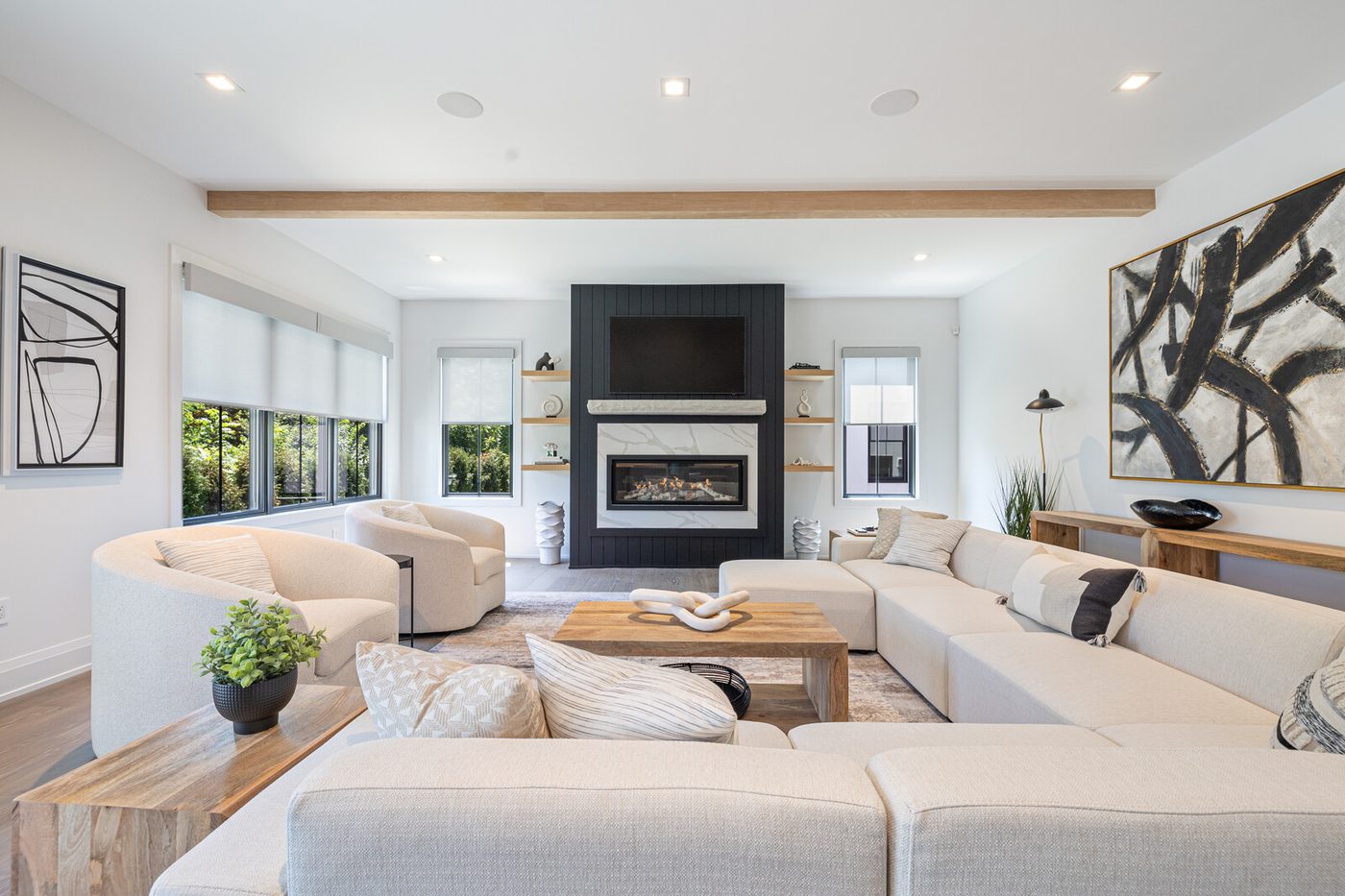 Living room with fireplace and mounted TV