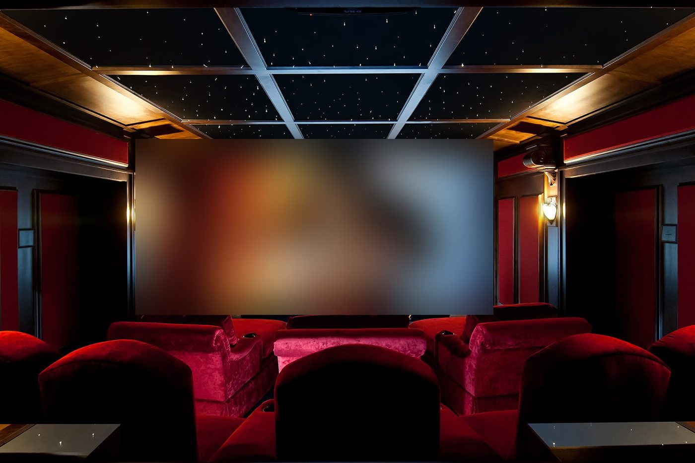 Home theater with starfield ceiling and sconces